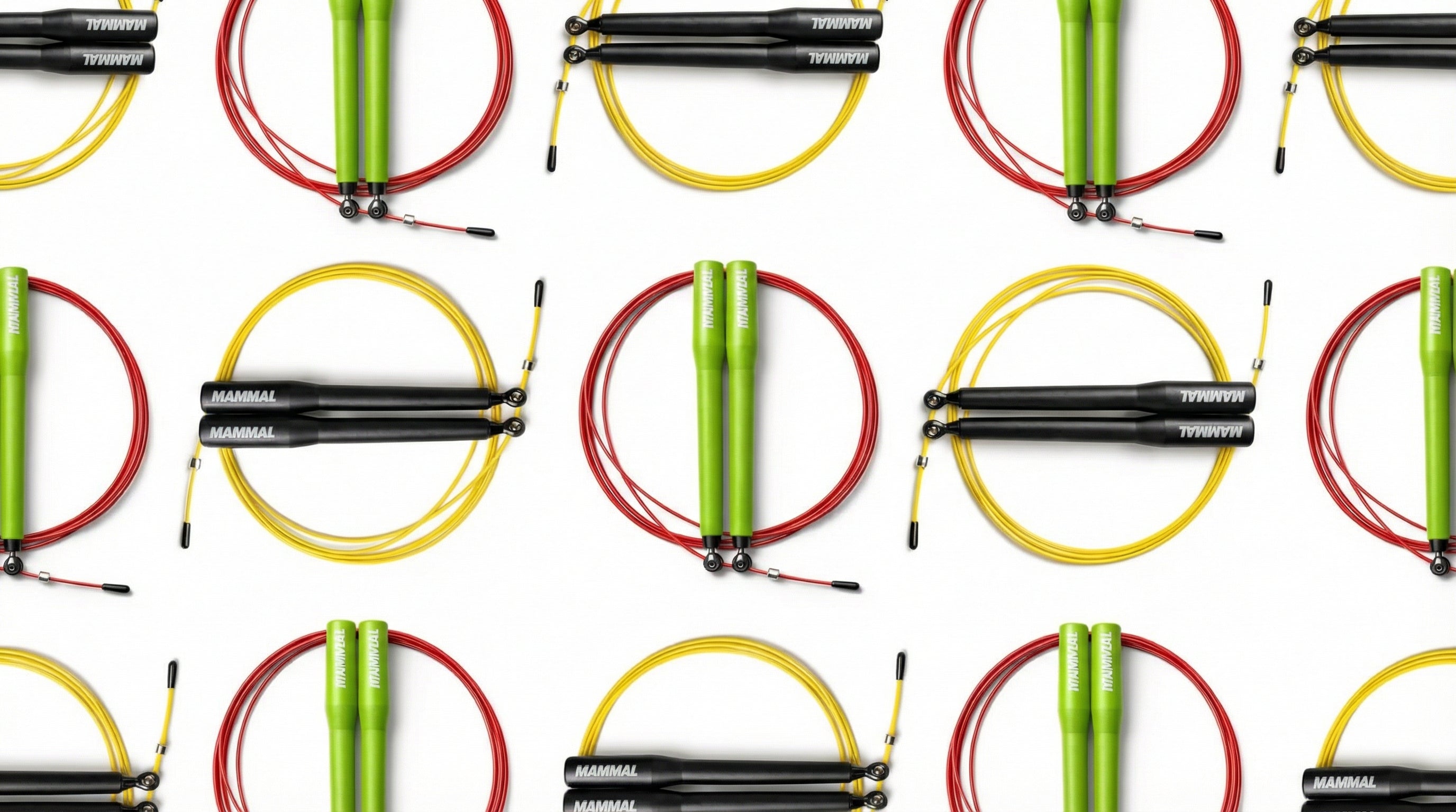 Speed skipping ropes in red yellow and green colourways on white background
