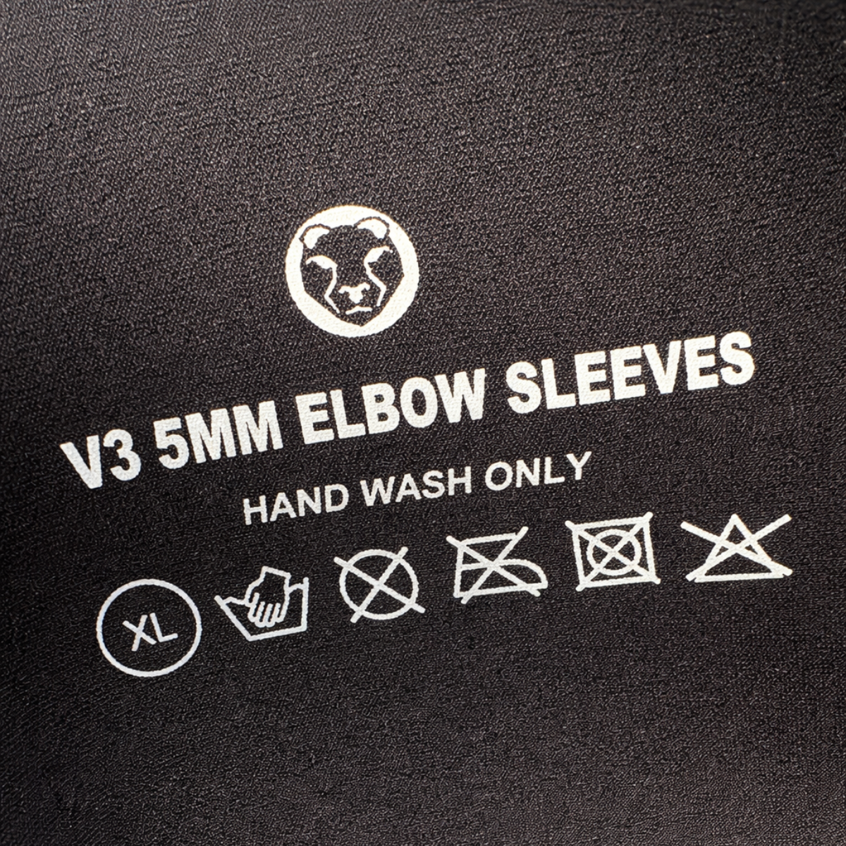 Care label on Mammal Strength V3 5mm elbow sleeves showing hand wash only washing instructions and care symbols