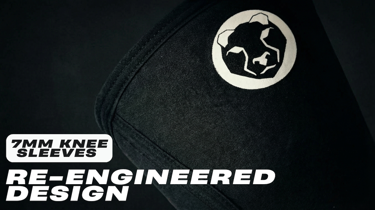 Black 7mm knee sleeve with Mammal Strength logo on a dark background highlighting re-engineered design
