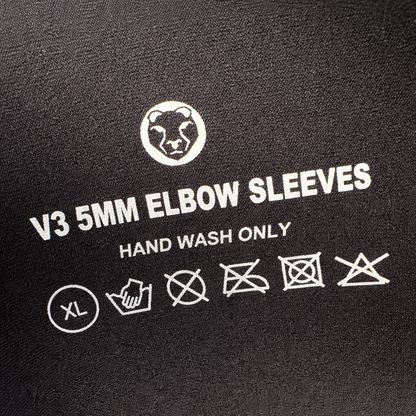 Care label on Mammal Strength V3 5mm elbow sleeves showing hand wash only washing instructions and care symbols

