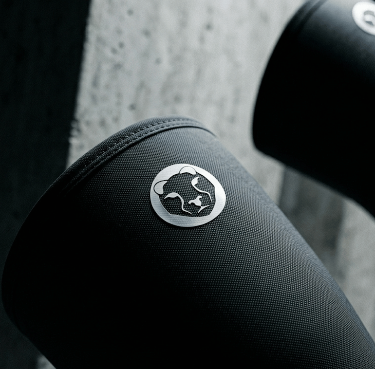 Close up of Mammal Strength V3 7mm knee sleeve showing logo and neoprene material texture