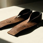 Leather Olympic lifting straps, editorial shot — Mammal Strength